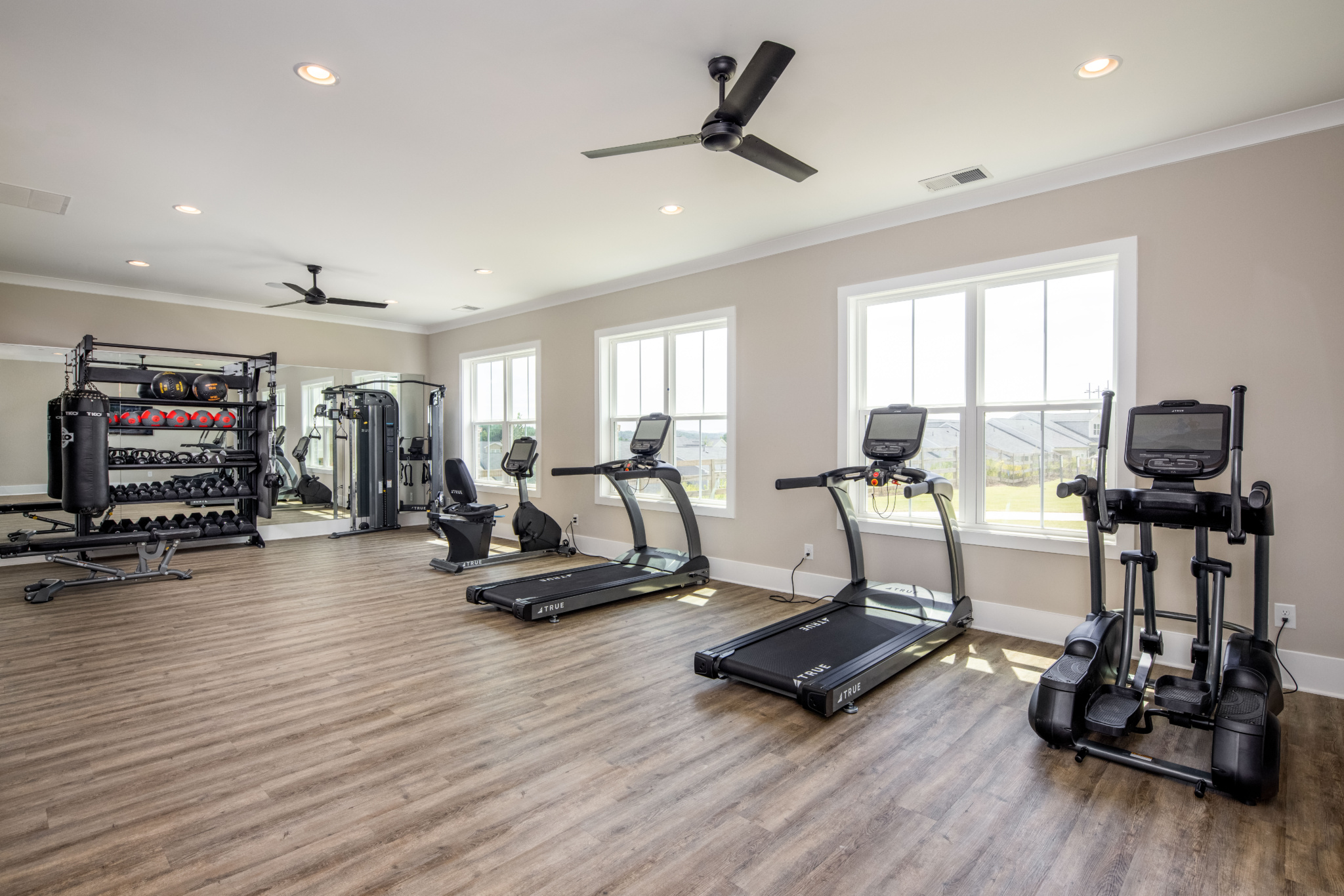 community center gym with treadmills and weights